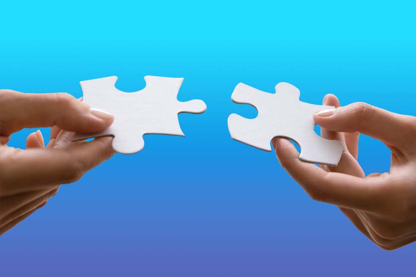 Hands and Puzzle Pieces